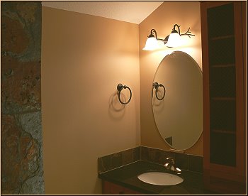 Luxurious bathrooms featuring slate, granite and premium hardware